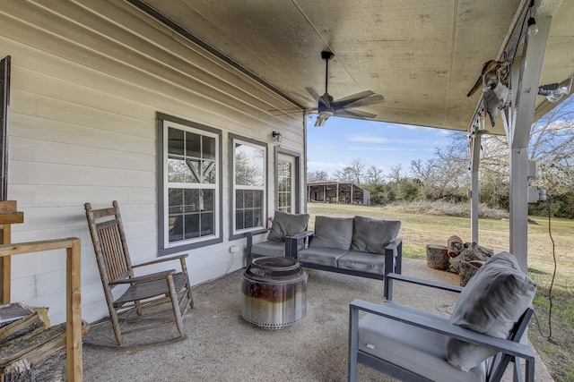 view of patio / terrace featuring ceiling fan and outdoor lounge area