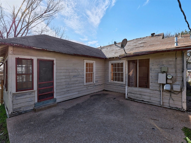 rear view of house featuring a patio area