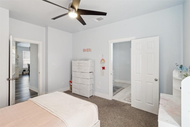 111 Lavender Cv, Dale, TX 78616 - carpeted bedroom with ceiling fan and baseboards