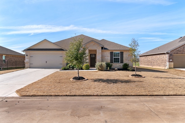 single story home with a garage