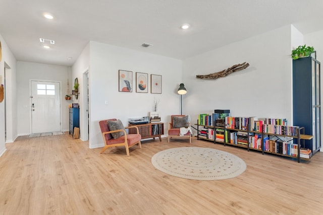 106 Sandpiper Dr, Bastrop, TX 78602 - sitting room with wood finished floors and recessed lighting