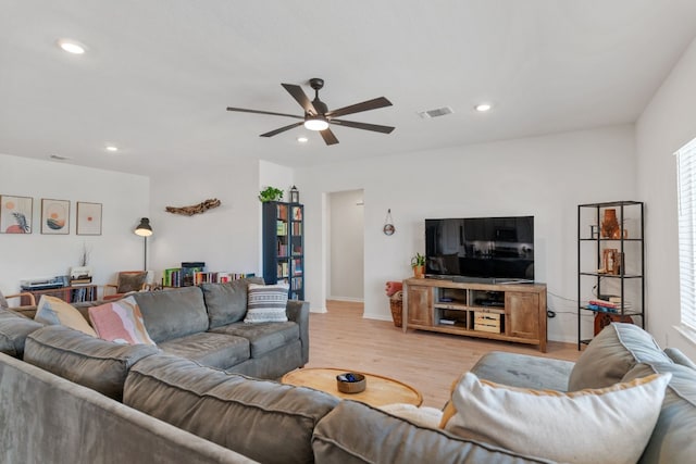 106 Sandpiper Dr, Bastrop, TX 78602 - living room featuring light wood-style floors, a ceiling fan, and recessed lighting