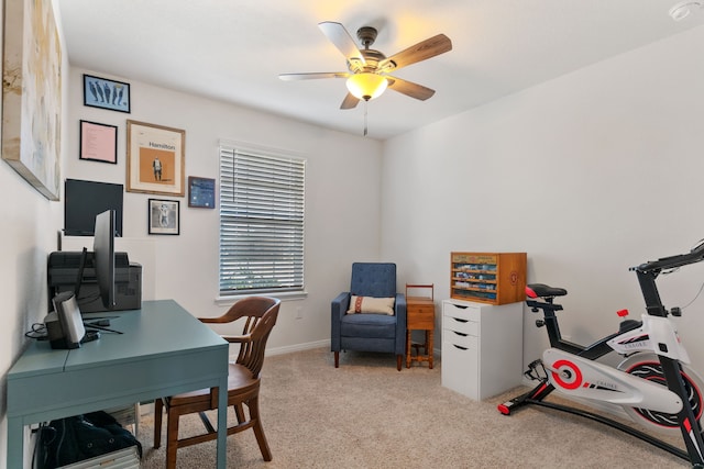 office space with ceiling fan and light colored carpet