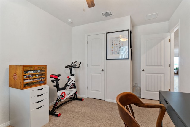 interior space with ceiling fan