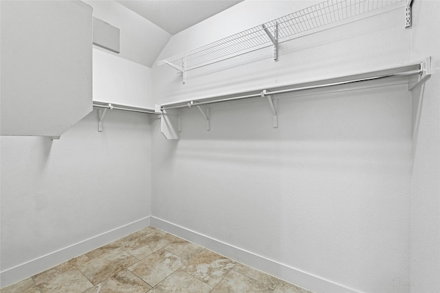 spacious closet with lofted ceiling