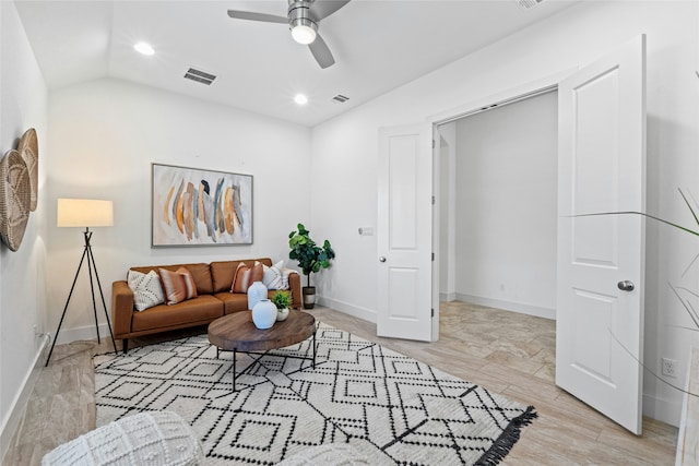 living room with vaulted ceiling and ceiling fan