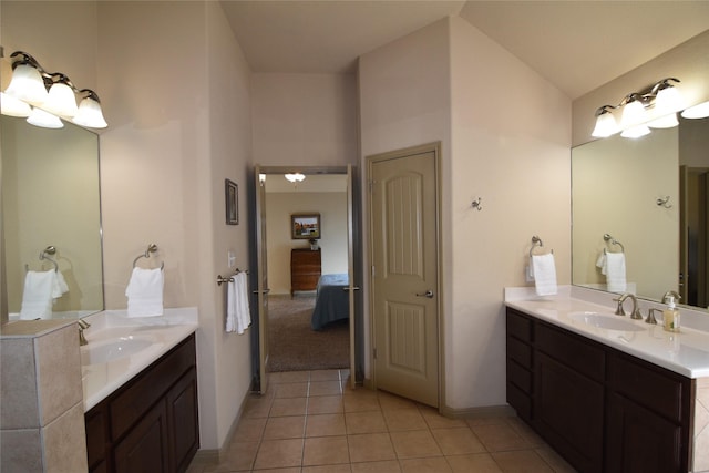 bathroom with vanity and tile patterned floors