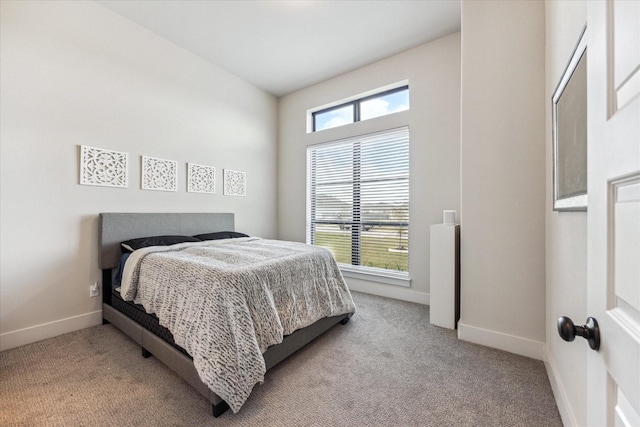 bedroom with light carpet