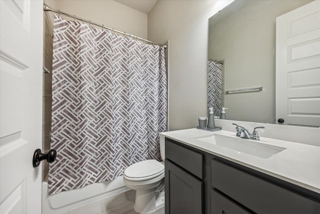 full bathroom with toilet, vanity, and shower / bath combination with curtain