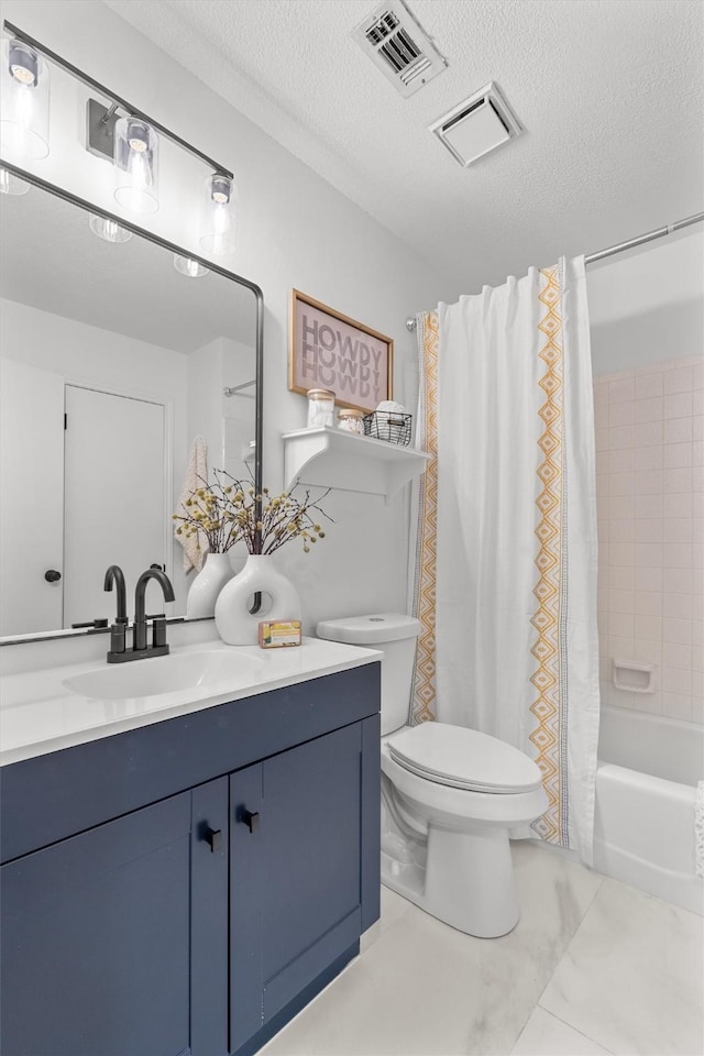 full bathroom featuring a textured ceiling, toilet, vanity, and shower / tub combo with curtain