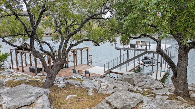 dock area with a water view