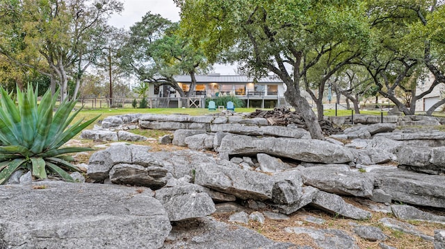 view of yard featuring a wooden deck