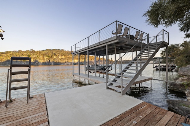 dock area featuring a water view