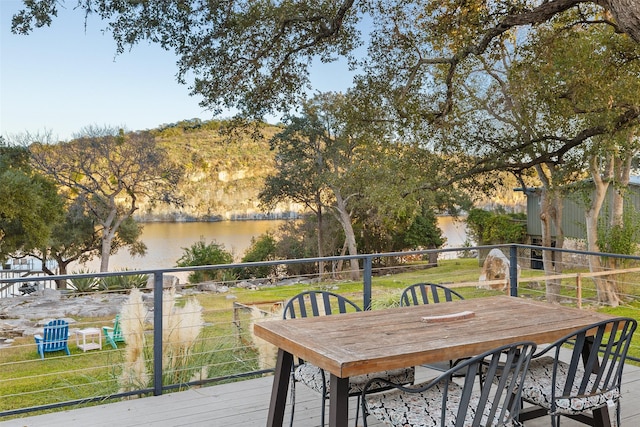 wooden deck with a water view