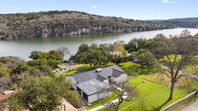 drone / aerial view with a water view