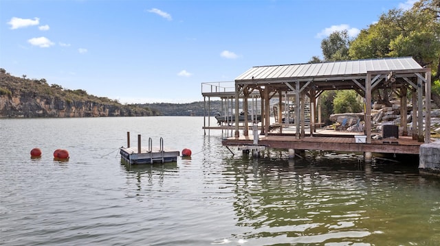 view of dock featuring a water view