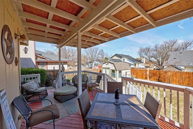 deck with an outbuilding