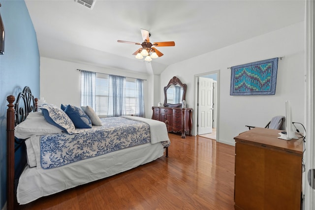 bedroom with ceiling fan and hardwood / wood-style floors