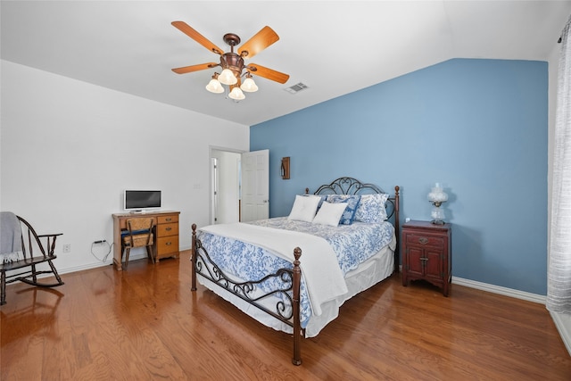 bedroom featuring ceiling fan, vaulted ceiling, and hardwood / wood-style flooring