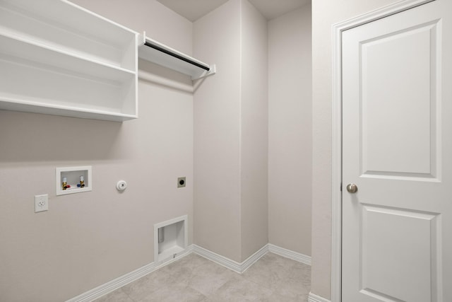 laundry room featuring hookup for an electric dryer, hookup for a washing machine, and hookup for a gas dryer