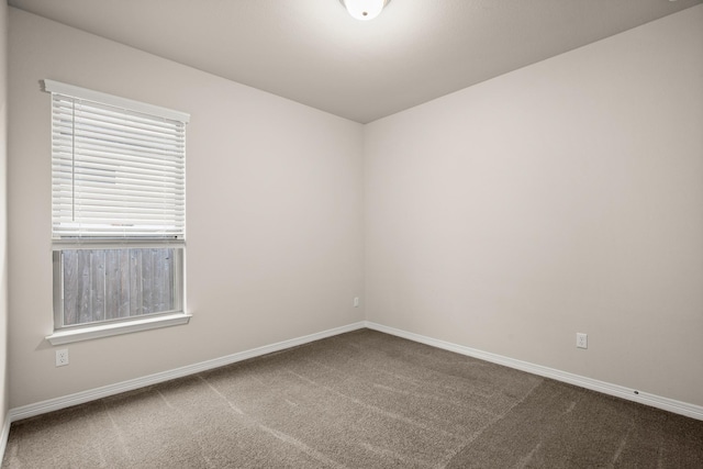 view of carpeted spare room