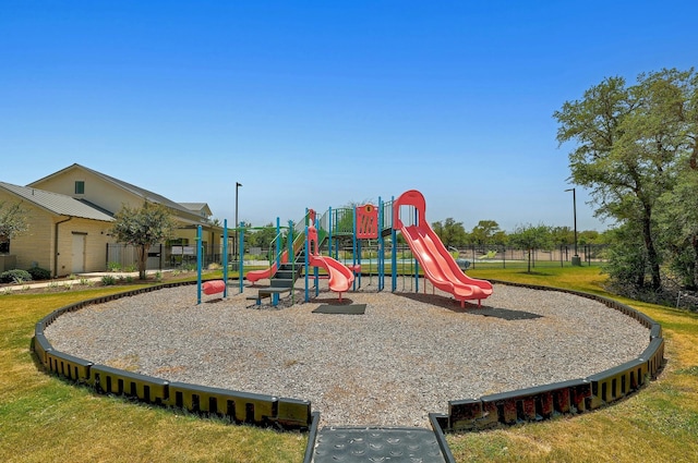 view of playground featuring a yard