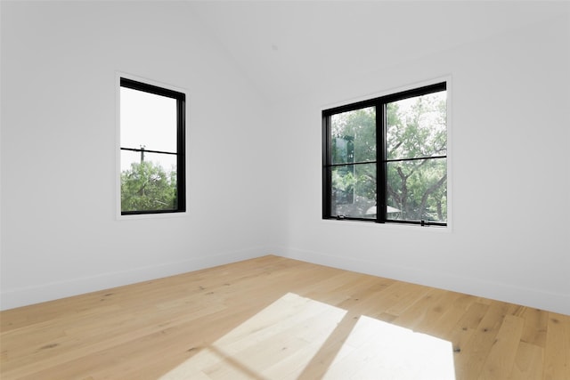 unfurnished room featuring wood-type flooring