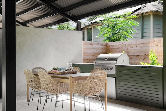 view of patio with exterior kitchen and grilling area