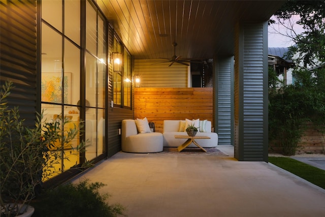 patio terrace at dusk with ceiling fan