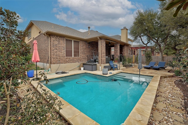 view of pool featuring a patio