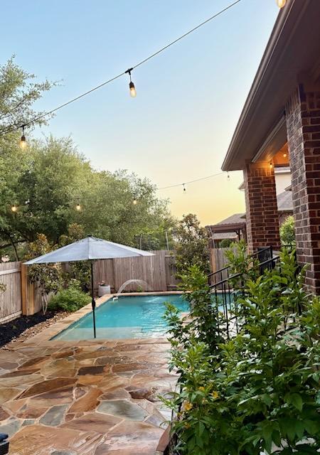 4408 Trinity Woods St, Leander, TX 78641 - view of pool with a fenced backyard and a patio