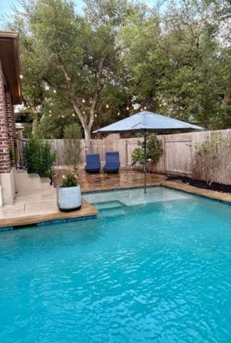 4408 Trinity Woods St, Leander, TX 78641 - view of swimming pool with a fenced backyard