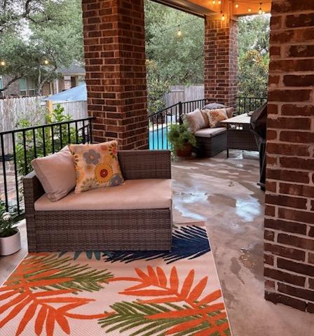 4408 Trinity Woods St, Leander, TX 78641 - balcony featuring an outdoor living space and view of pool