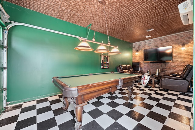 game room featuring pool table and brick wall