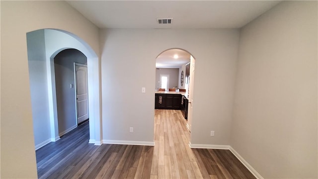 hall featuring hardwood / wood-style flooring