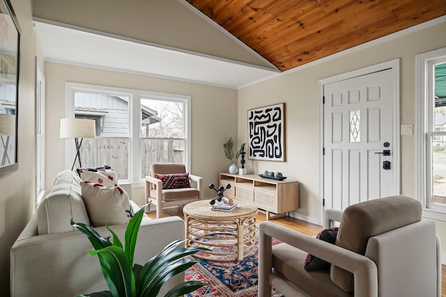 living room with hardwood / wood-style floors, vaulted ceiling, and wooden ceiling