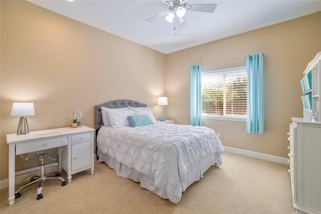 bedroom with light carpet and ceiling fan