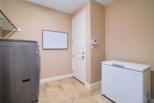 laundry area with washer / dryer