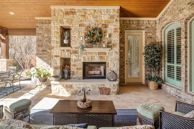 view of patio / terrace with an outdoor stone fireplace