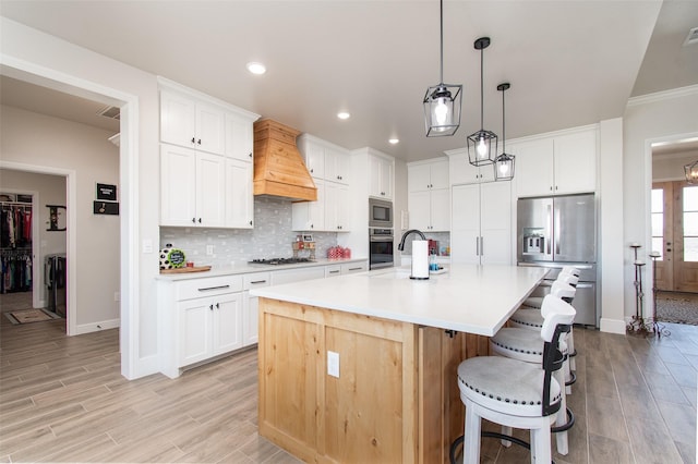 kitchen with white cabinets and stainless steel appliances