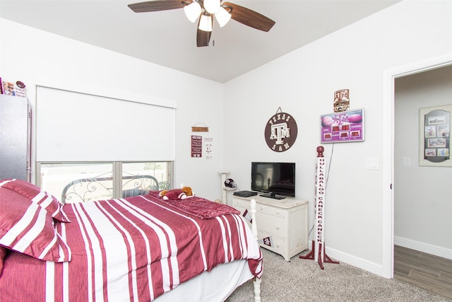 bedroom with ceiling fan and carpet flooring