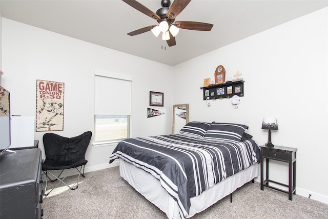 bedroom with ceiling fan and carpet floors