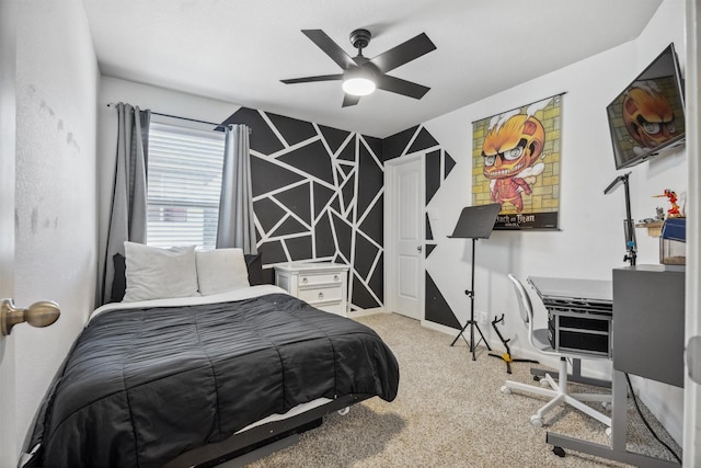 bedroom featuring ceiling fan and light carpet