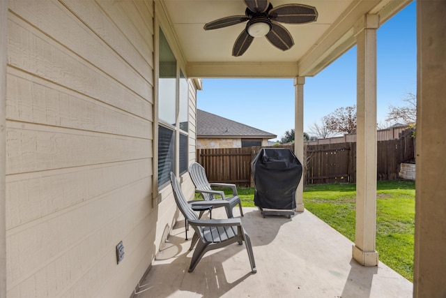 view of patio / terrace featuring ceiling fan and grilling area