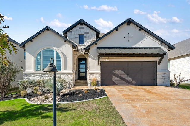 view of front facade with a garage and a front yard