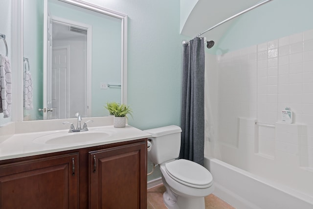 full bathroom featuring toilet, shower / bath combination with curtain, and vanity