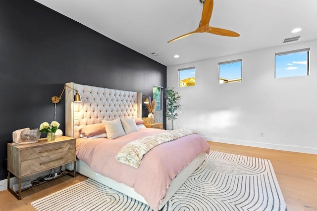 bedroom featuring ceiling fan and light wood-type flooring