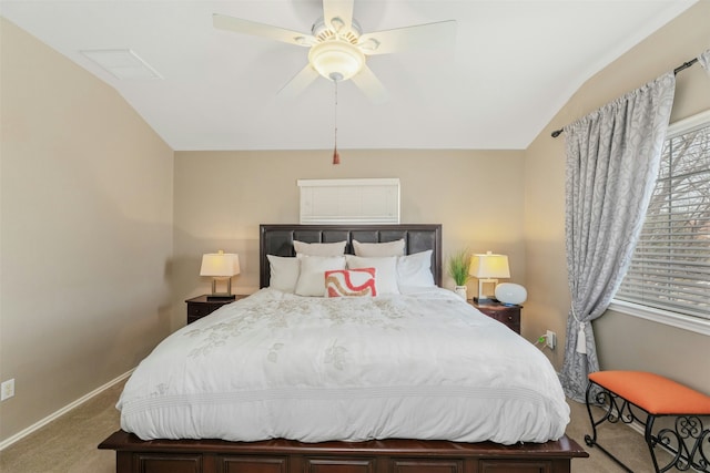 bedroom with ceiling fan, light carpet, and lofted ceiling