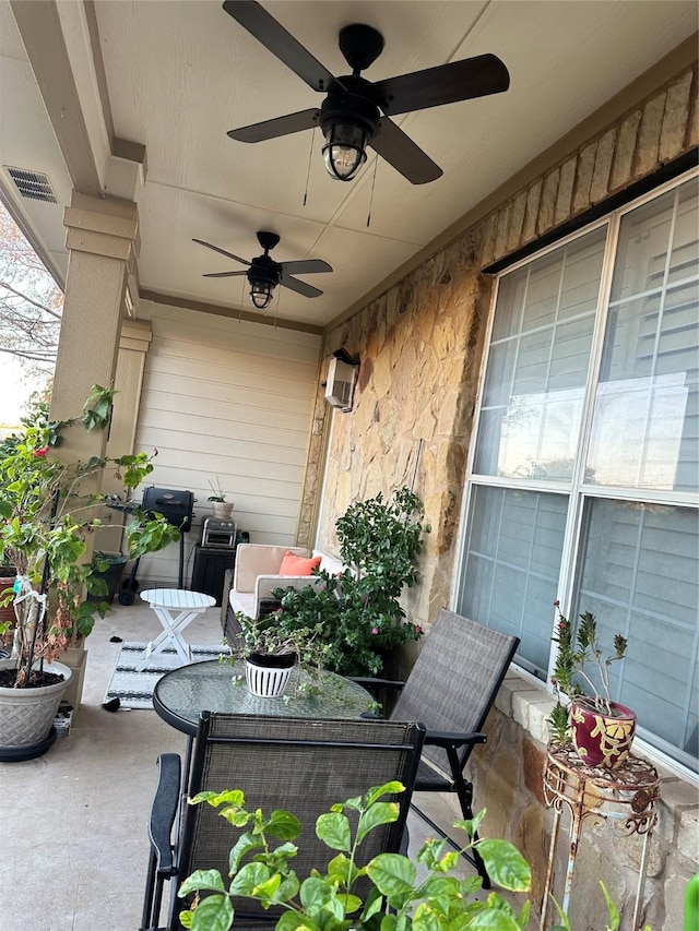 view of patio with ceiling fan