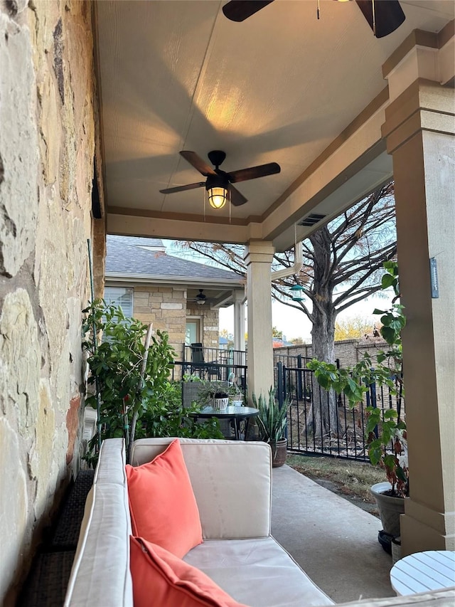 view of patio featuring an outdoor hangout area and ceiling fan